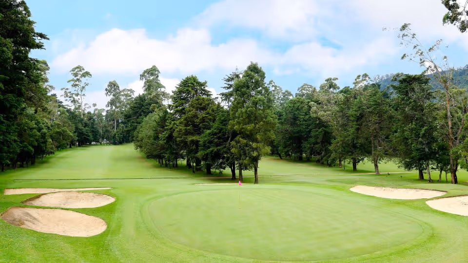Golf course at Nuwara Eliya Golf Club nestled among tea plantations